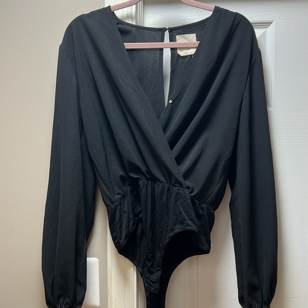 Francesca’s black dressy bodysuit